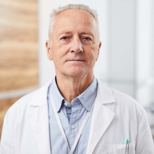 portrait-of-senior-doctor-U2R8QDT.jpg